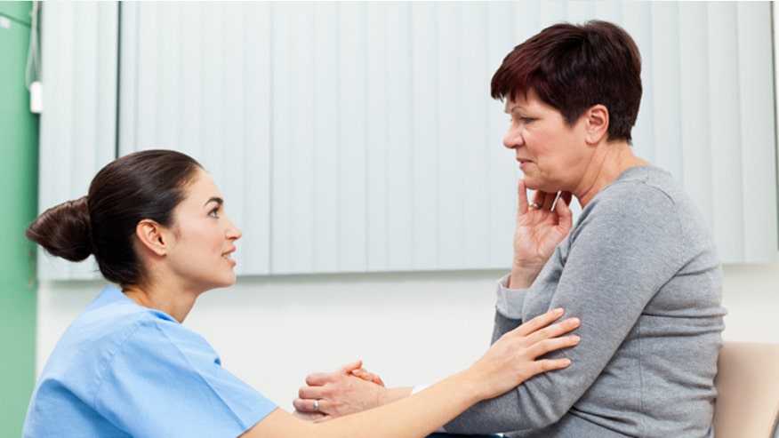 Female patient and doctor istock.jpg